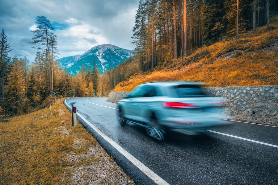 blurred car in motion on the road in orange forest 2026 01 06 09 04 47 utc